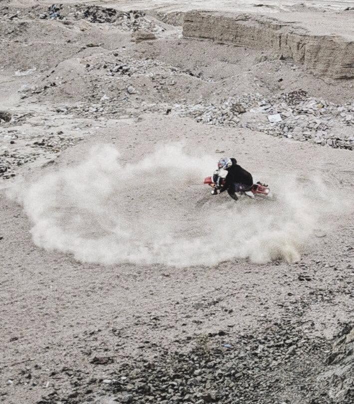 Motorcycle in the dust