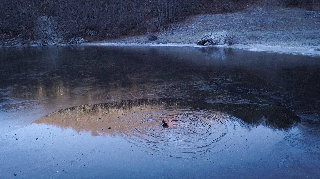 Swimming in a frozen lake
